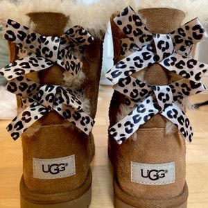 Kids UGG Bailey Bow Boot color Chestnut in size 3. The bows are Cheetah print.